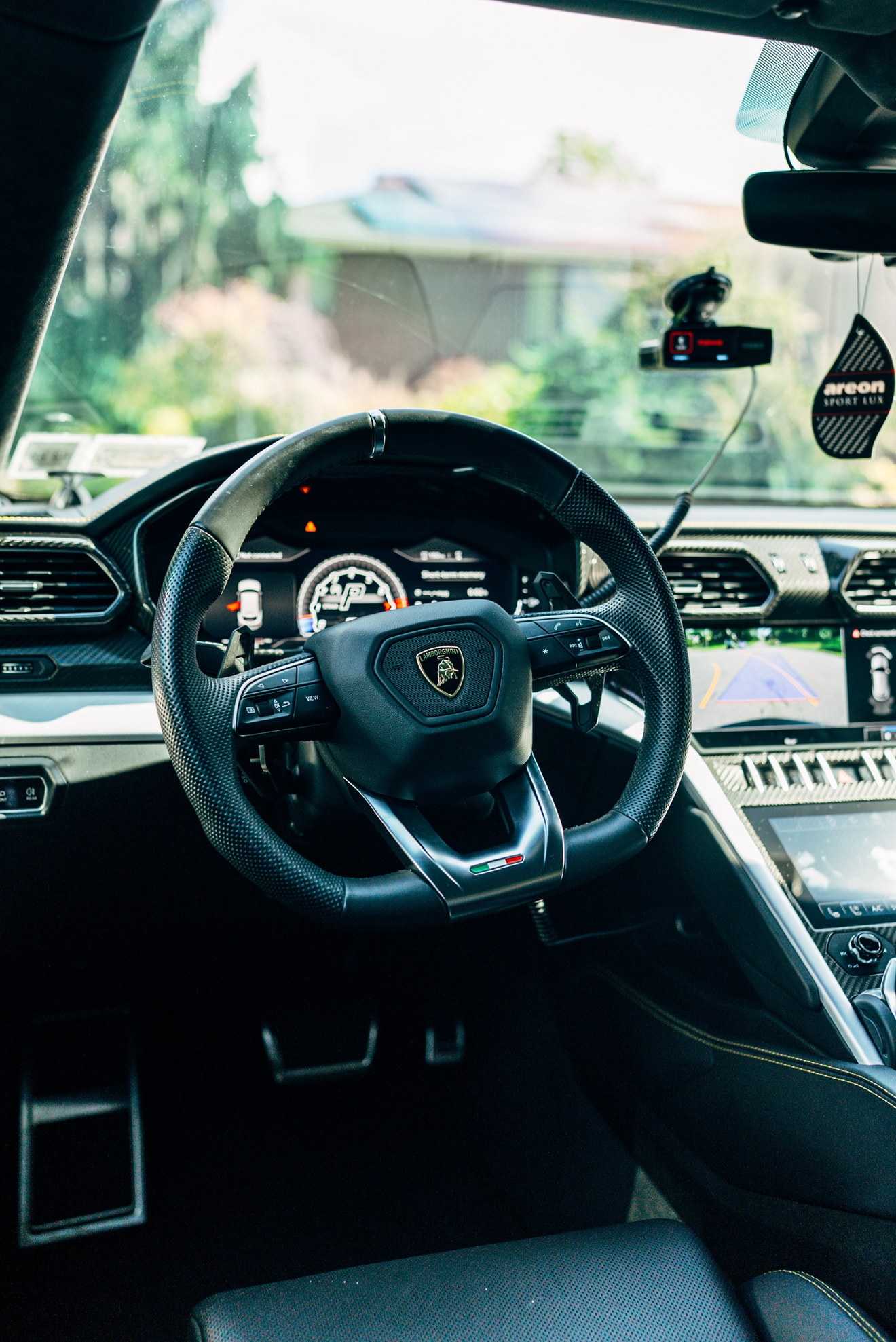 Driver cockpit and dashboard of the matte black Lamborghini Urus