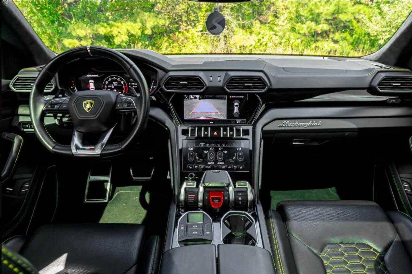 Dashboard and center console of the red Lamborghini Urus