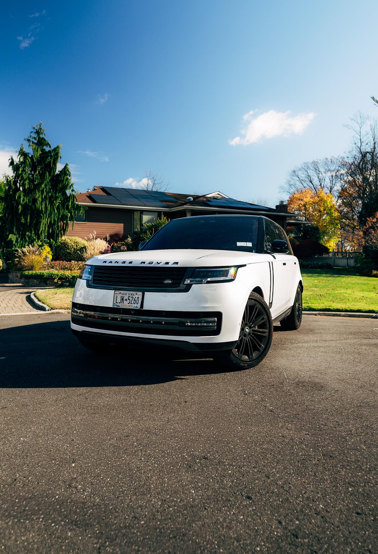 White Range Rover shown from the front three-quarter angle