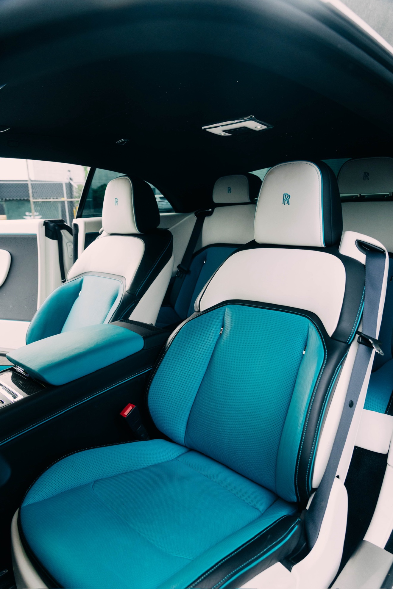 White and blue rear seating in the Rolls-Royce Spectre